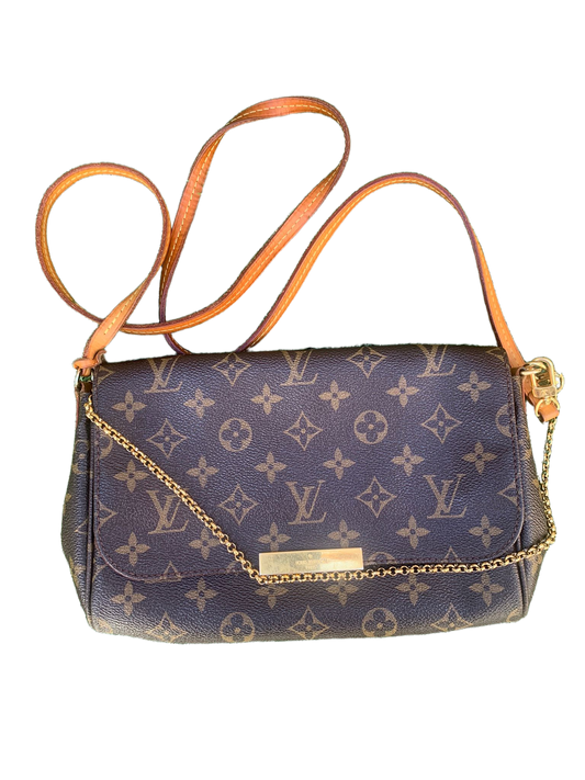 Processed image for Pochette Lv monogram